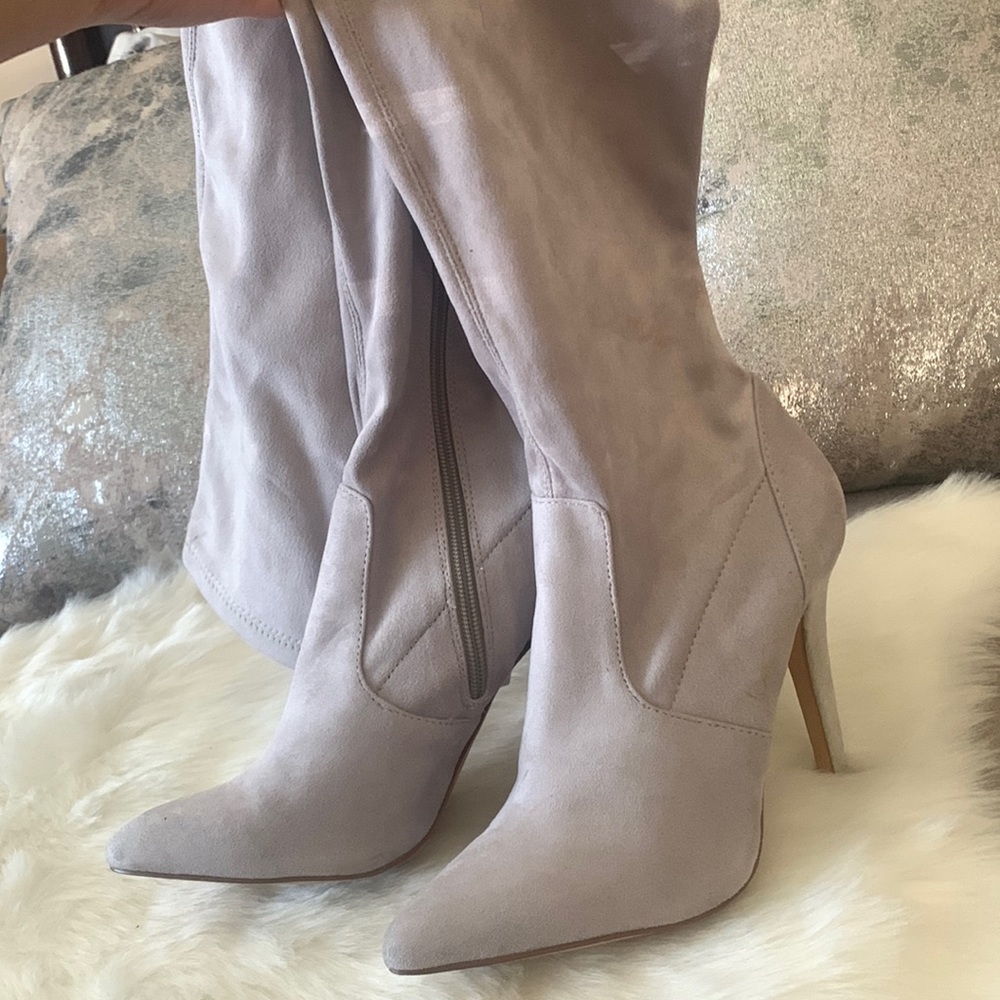 Mid thigh boots
